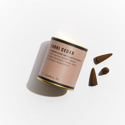 P.F. Candle Co. Wholesale - Enoki Cedar Alchemy Scented Incense Cones Paper Tube of 30 - Product - Each cone burns for approximately 20-25 minutes each. Our wood-based incense cones are hand-dipped into fine fragrance oils at our Los Angeles factory. 