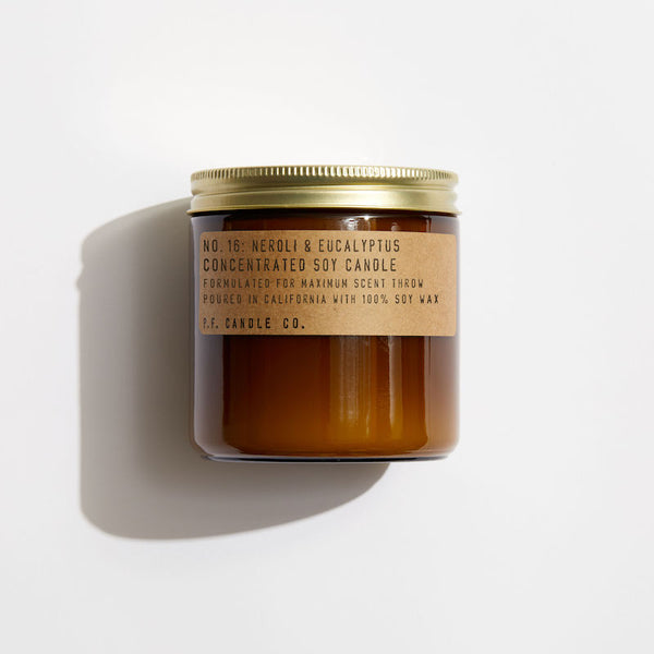 P.F. Candle Co. Wholesale Neroli & Eucalyptus Large Concentrated Candle - Product - Hand-poured into apothecary inspired amber jars with our signature kraft label and a brass lid.