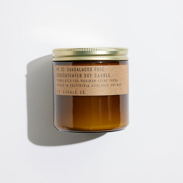 P.F. Candle Co. Wholesale Sandalwood Rose Large Concentrated Candle - Product - Hand-poured into apothecary inspired amber jars with our signature kraft label and a brass lid.