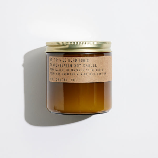 P.F. Candle Co. Wholesale Wild Herb Tonic Large Concentrated Candle - Product - Hand-poured into apothecary inspired amber jars with our signature kraft label and a brass lid.