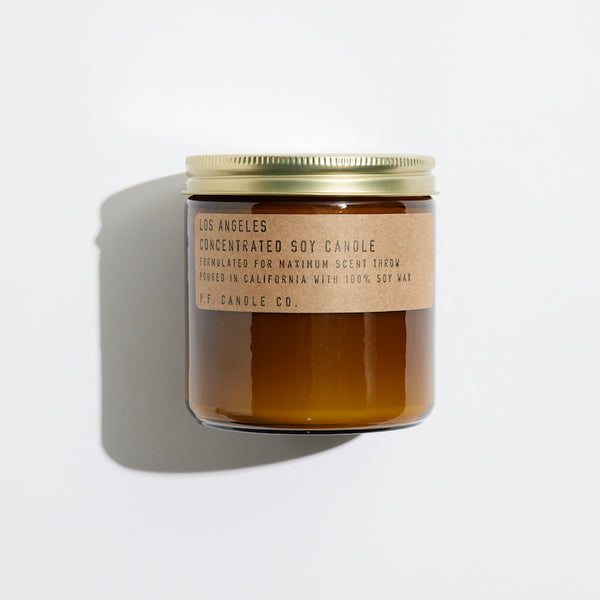 P.F. Candle Co. Wholesale Los Angeles Large Concentrated Candle - Product - Hand-poured into apothecary inspired amber jars with our signature kraft label and a brass lid.