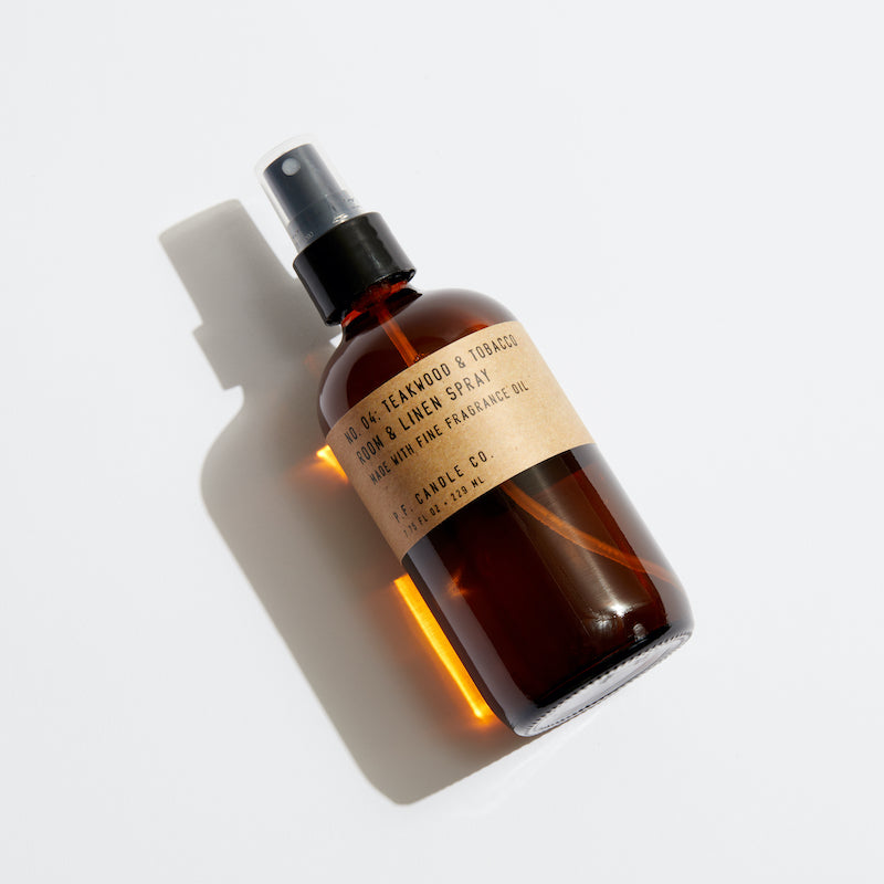 P.F. Candle Co. Wholesale Teakwood & Tobacco Room & Linen Spray - Product - Made in California, each amber glass bottle contains a 7.75 fl oz blend of body-safe fine fragrance oils and water.
