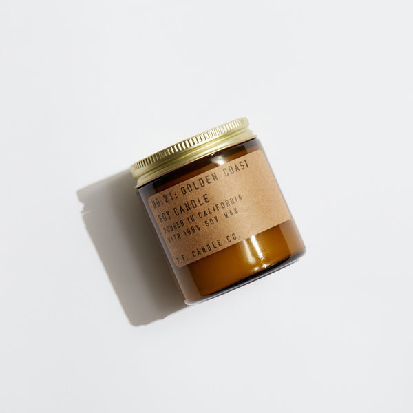 P.F. Candle Co. Wholesale Golden Coast Mini Candle - Product - Hand-poured into apothecary inspired amber jars with our signature kraft label and a brass lid.