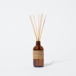 P.F. Candle Co. Wholesale Amber & Moss Reed Diffuser - Product - Apothecary-inspired amber glass bottles with our signature kraft label and rattan reeds. Low-maintenance scent throw, all day long - no match necessary.