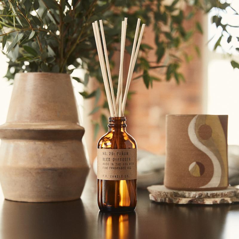 P.F. Candle Co. Wholesale Piñon Reed Diffuser - Lifestyle - with scent notes of piñon logs, cedar, and vanilla