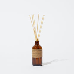 P.F. Candle Co. Wholesale Sandalwood Rose Reed Diffuser - Product - Apothecary-inspired amber glass bottles with our signature kraft label and rattan reeds