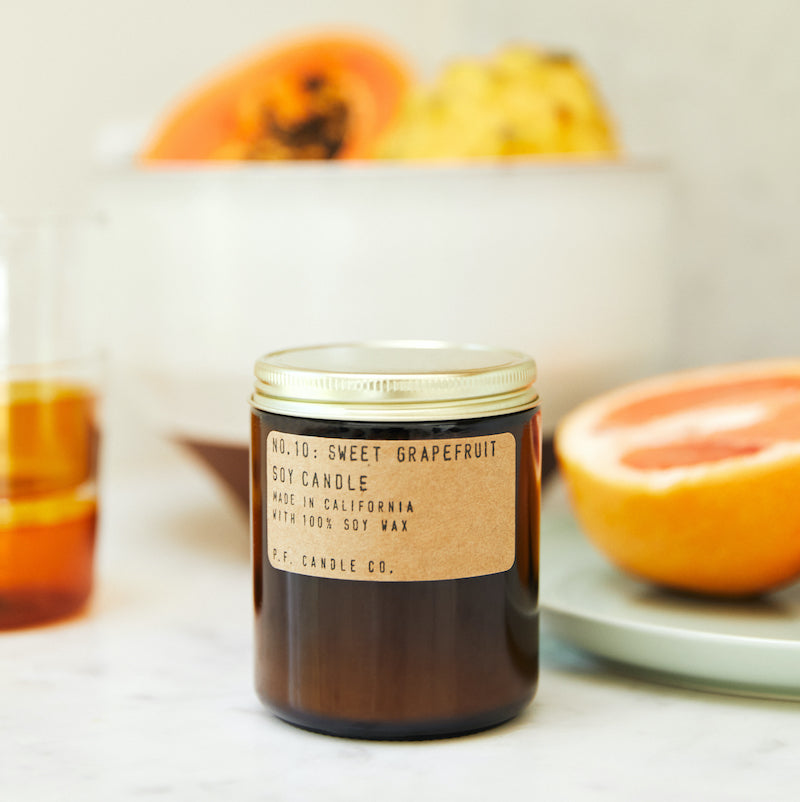 P.F. Candle Co. Wholesale - Sweet Grapefruit - Classic 7.2 oz Standard Soy Wax Candle - Lifestyle - Ice cold lemonade. Dinner on the patio with your favorite people. Grapefruit, yuzu, and lemon