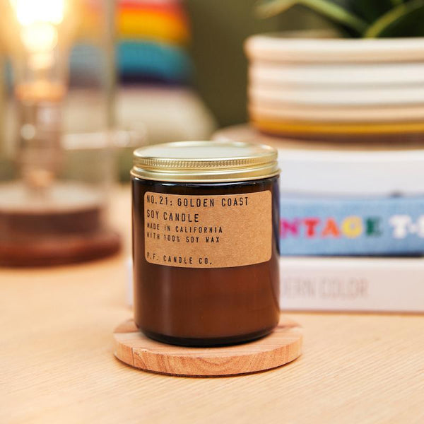 P.F. Candle Co. Wholesale Golden Coast Standard Candle - Lifestyle - inspired by Big Sur magic, wild sage baking in the sun, the rumble of waves and rocks with scent notes of eucalyptus, sea salt, redwood, and palo santo