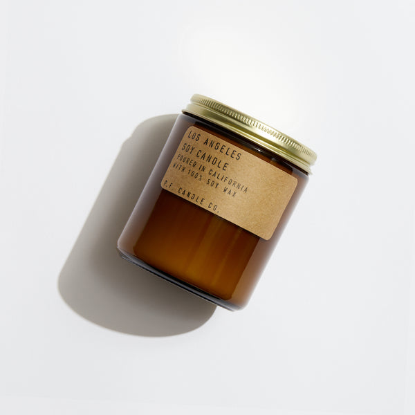 P.F. Candle Co. Wholesale Los Angeles Standard Candle - Product - Our 7.2 oz Standard Candles are hand-poured into apothecary inspired amber jars with our signature kraft label and a brass lid. This is our most popular size and is meant for dressers, countertops, nightstands – basically everywhere.