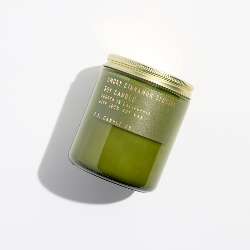 P.F. Candle Co. Wholesale Smoky Cinnamon Special Limited Winter Classics Candle - Product - Hand-poured into apothecary inspired amber jars with our signature kraft label and a brass lid.