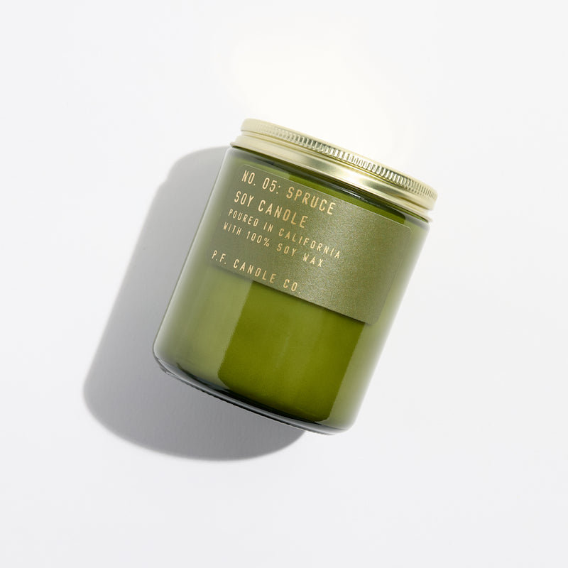 P.F. Candle Co. Wholesale Spruce Limited Winter Classics Candle - Product - Hand-poured into apothecary inspired amber jars with our signature kraft label and a brass lid.